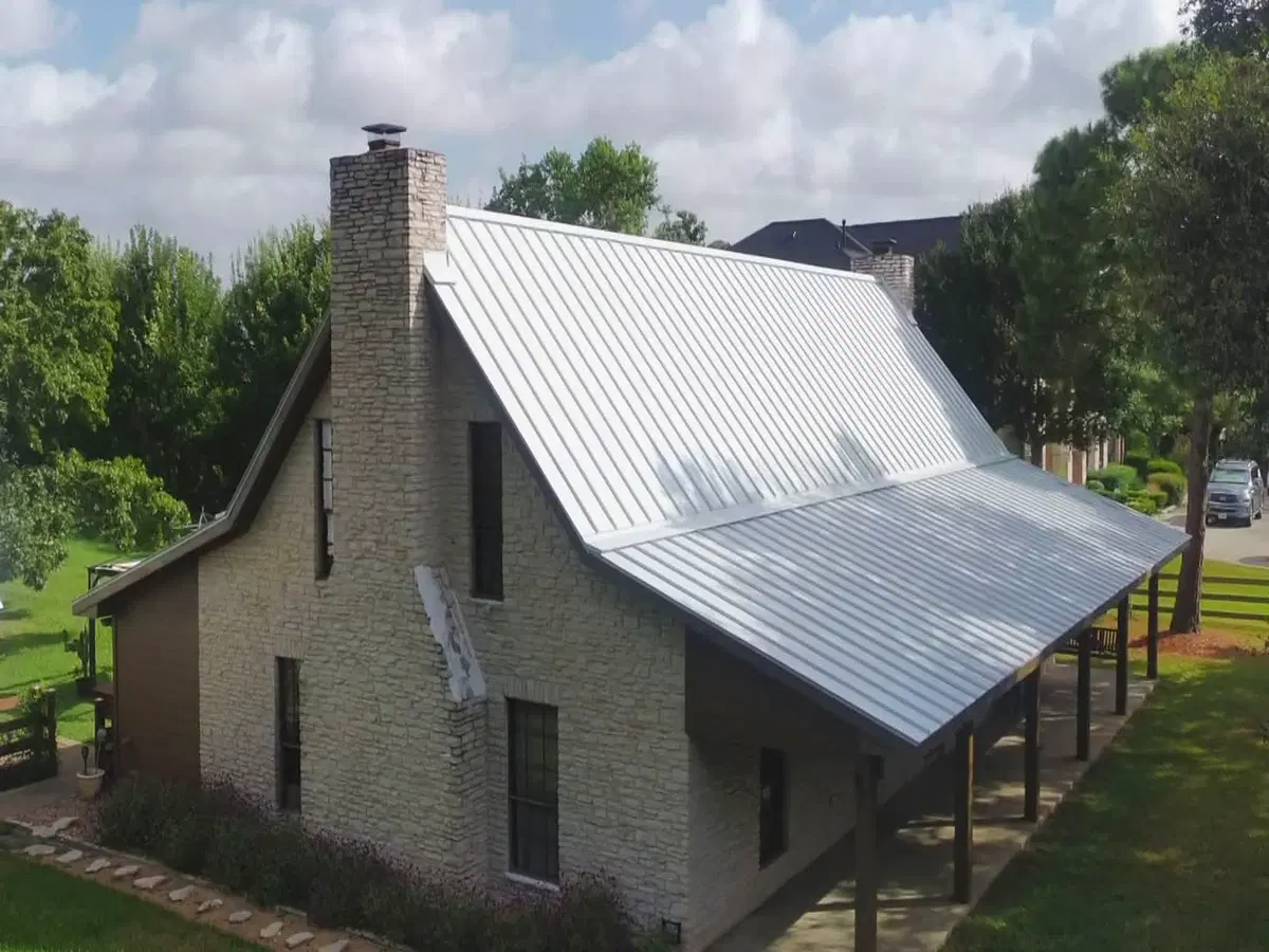 Light-colored metal roof on a residential home