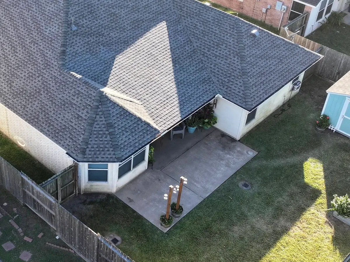 Aerial view of a finished gray shingle roof